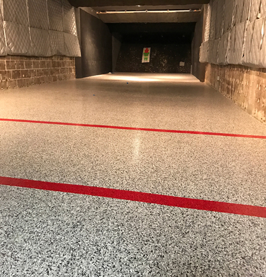 Epoxy quartz floor in an indoor shooting range